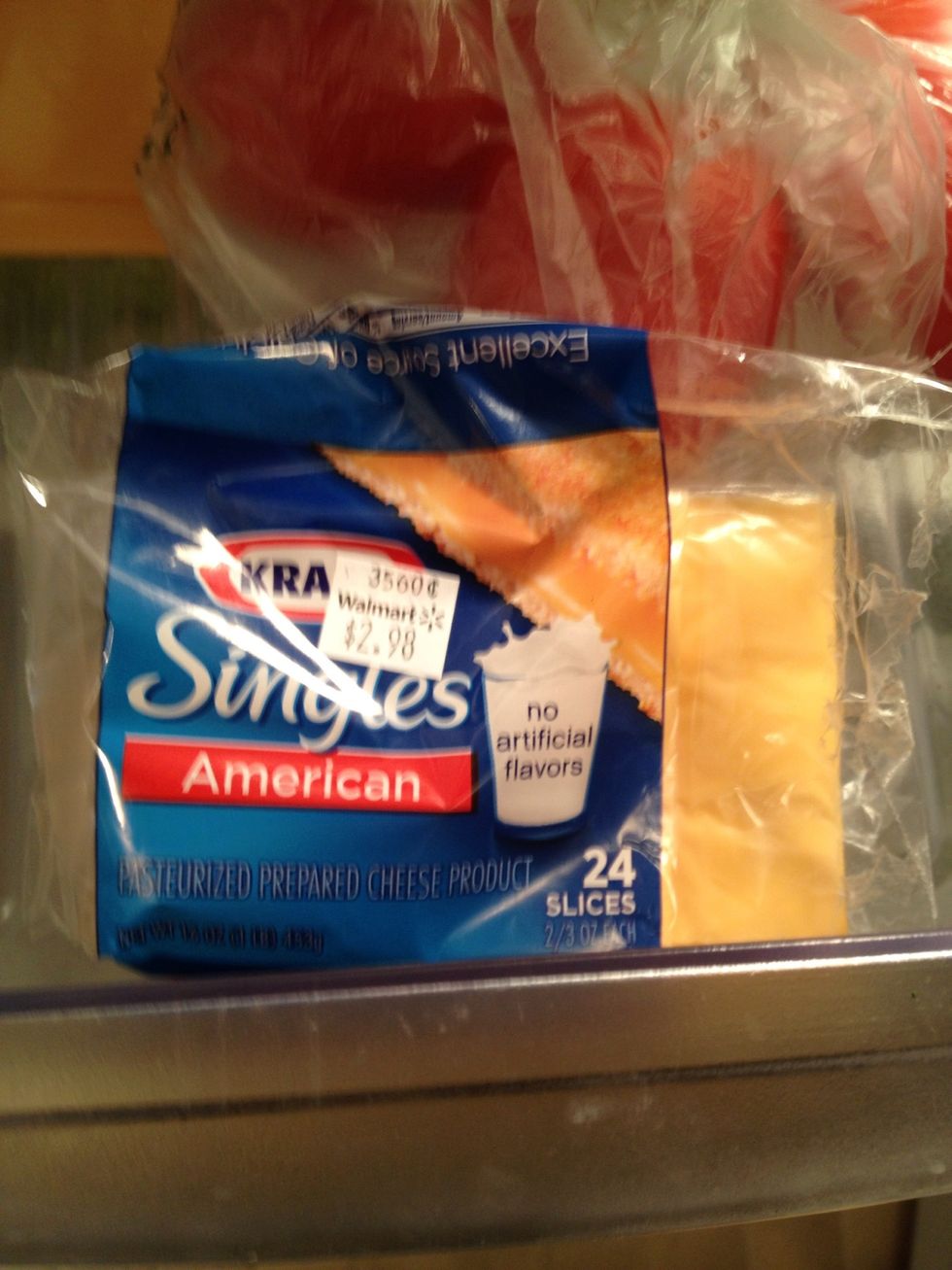 the 4 slices of cheese (you can use any better cheese, I only had this thing) oh well!