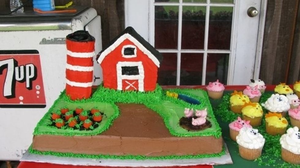 The adorable cake was made by a cousin. Notice the pumpkin patch and pigs in the mud?