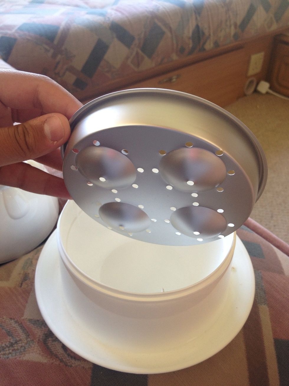 The aluminium plate comes out too.