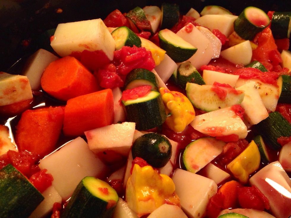 The amount of stock / liquid you add is up to you. It should cover all the vegetables if you intend to put a lid on and just leave it for a few hour unattended.