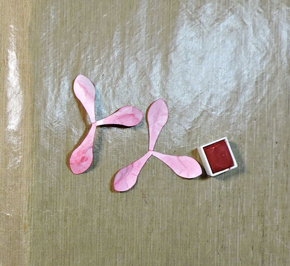 The amount of water you use will determine the final color of your flower. Here, I used a very deep red to create pink petals.