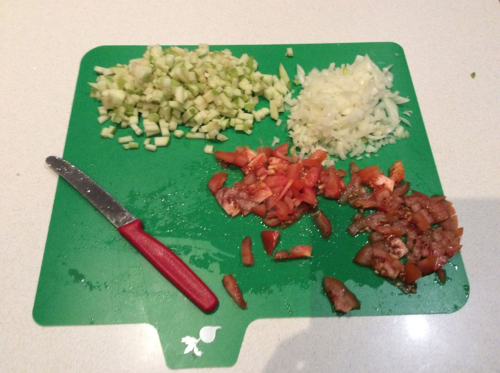 The apple, tomatoes and onion diced