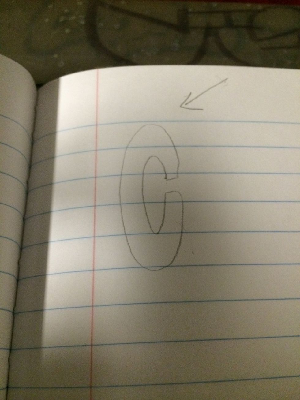 The arrow represents where light would be coming from to create a shadow