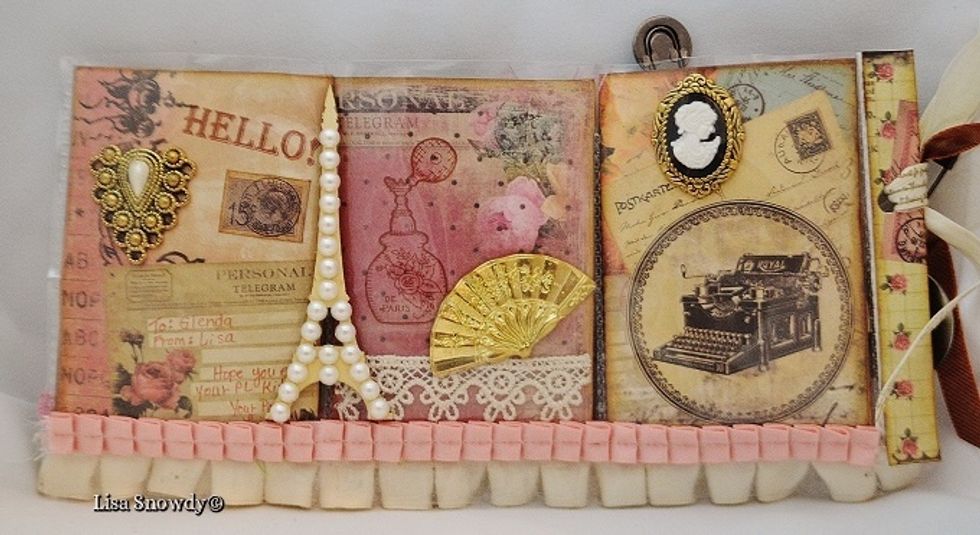 The back 3 pockets were decorated with vintage images from the paper pack and embellished with vintage findings. I added a wood veneer Eiffel Tower which I decorated with pearls.