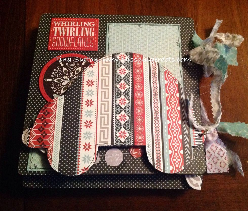 The back page is just covered with paper and outlined with the marker. Add rings and ribbon. Add photos and enjoy!