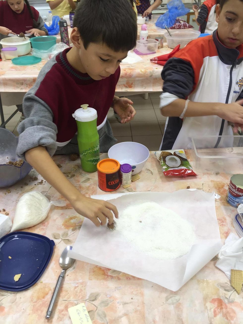 The balls were then rolled onto the coconut flakes as the final step!