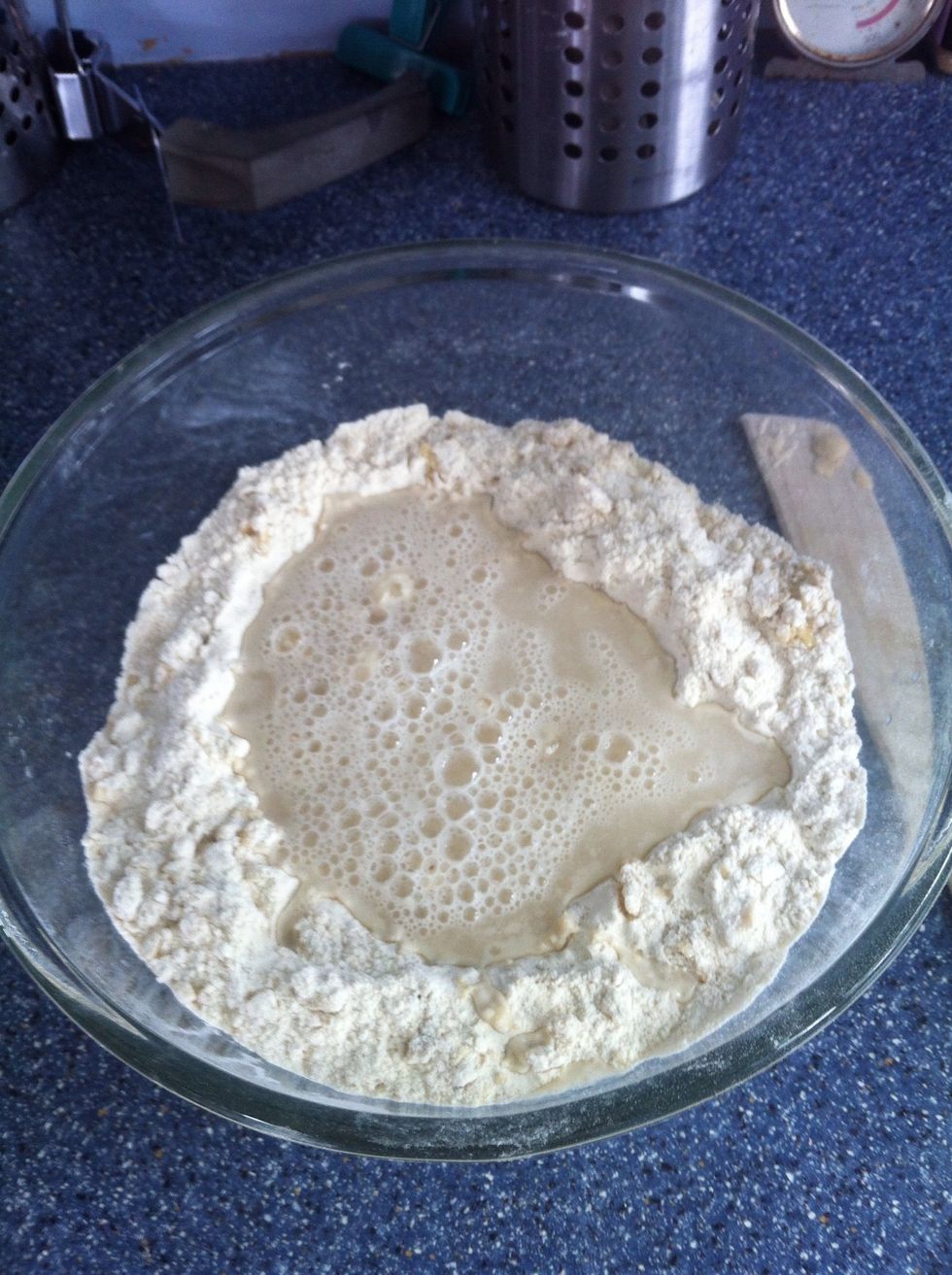 The Base: Add the flour, olive oil, salt, yeast & warm water.