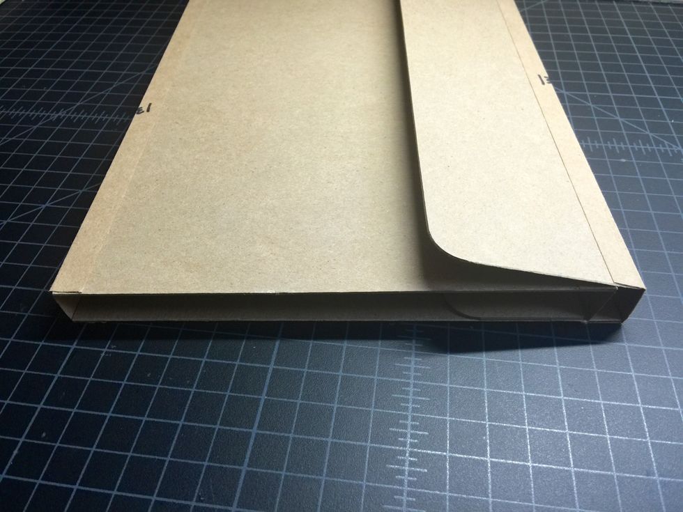 The base of the cover is done! Let's add some design paper...