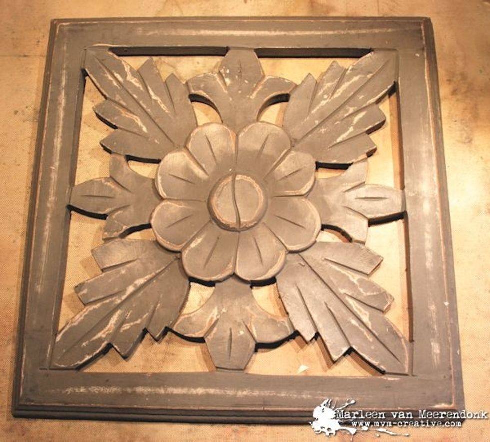 The basis is a wooden panel.