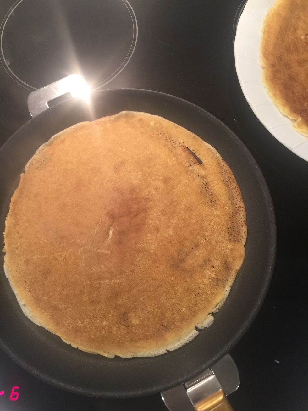 The batter should be very liquidly. On medium heat, proceed to cook the blinis as you would do any crepe or pancakes.  The tradition is to make a big heap of them oh la la