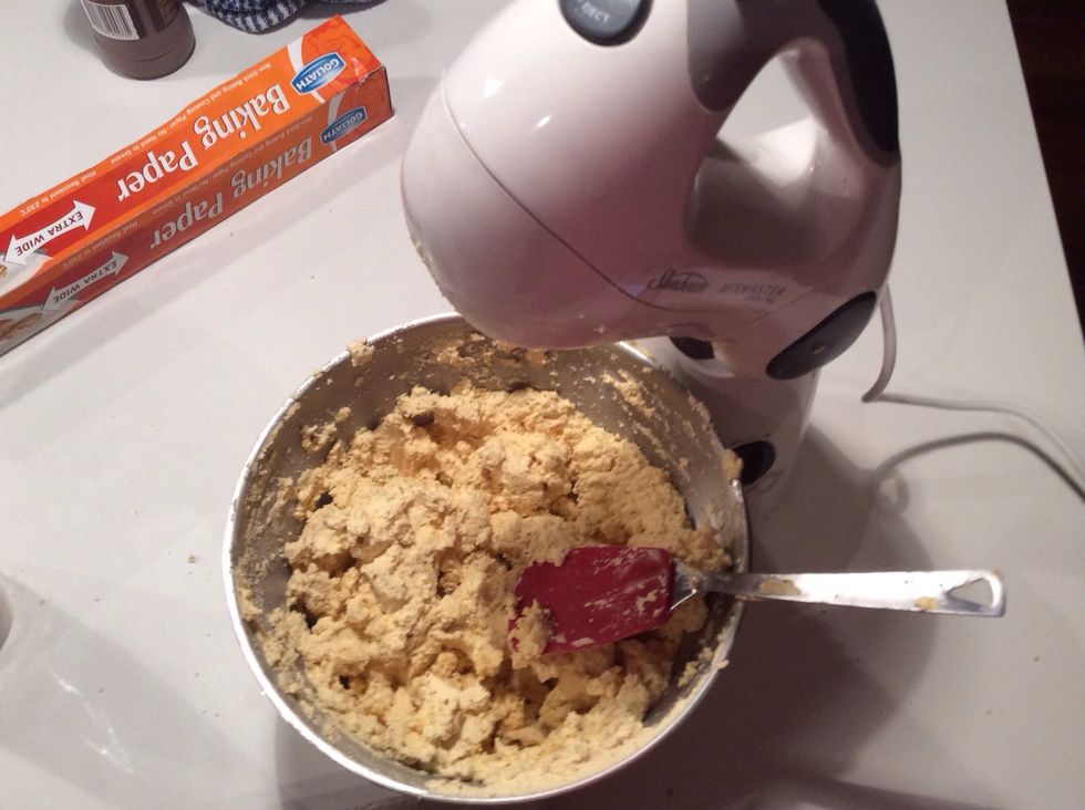 The batter should become crumbly but still remain firm and stay together.