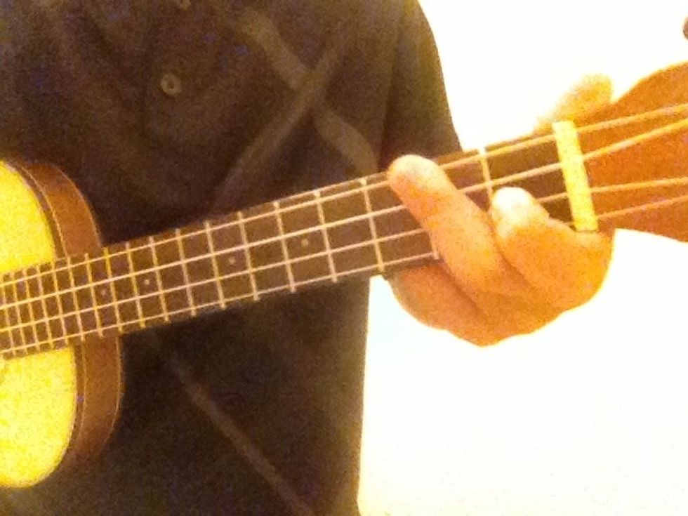 The beginning of the bridge starts off with a Dm. Put your pointer finger on the 1st fret on the 3rd string. Next place your middle finger across the 2nd fret so it covers the 1st and 2nd string.