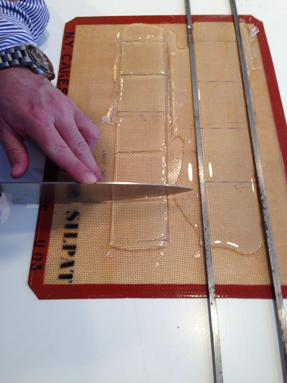 The big knife was used to make the short side cuts and to make impressions on the windows.