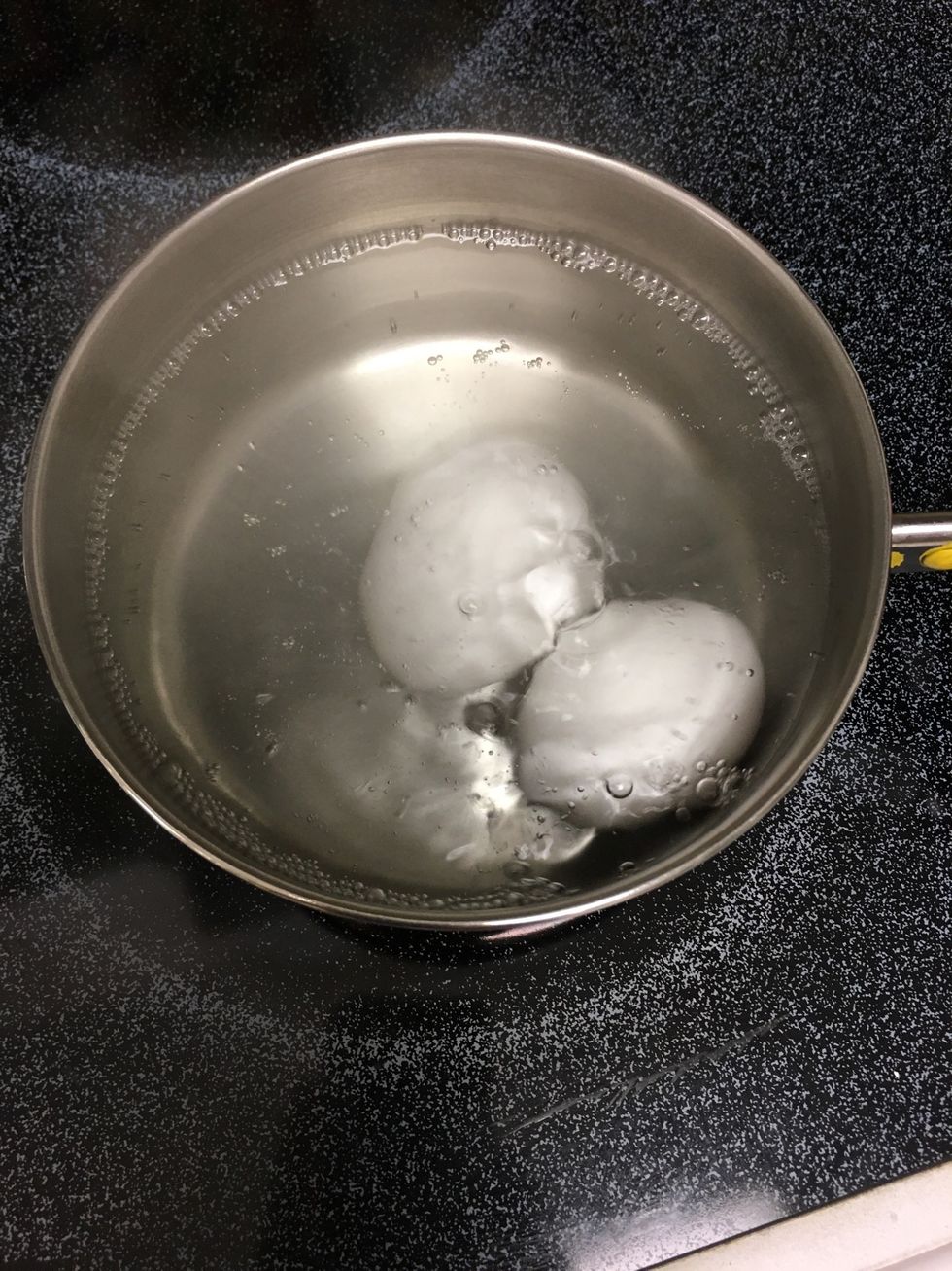 The boiling eggs.