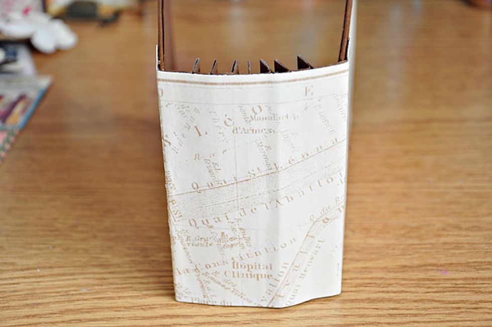 The book spine. As mentioned in previous step, I suggest that you adhere a chipboard or cardboard first before covering with another cardstock or patterned paper.