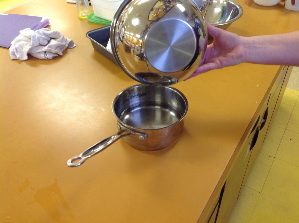 The bottom of the bowl should not touch the water. If it does pour some water out.