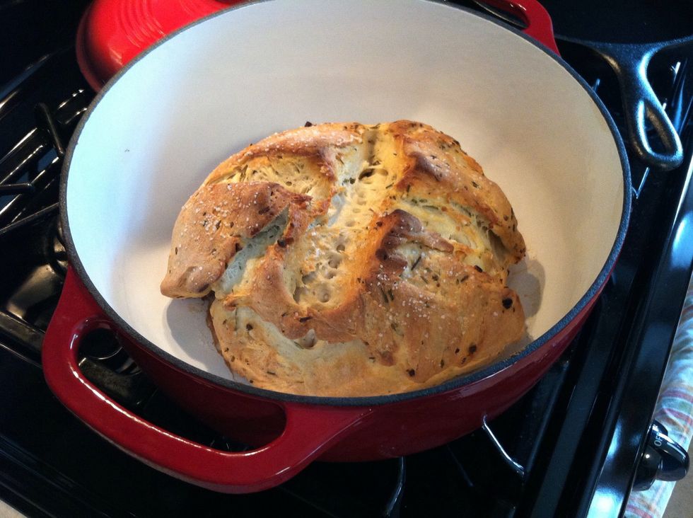 The bottom of your bread will likely be crisp and dark. Just slice off the bottom with a sharp, serrated knife.