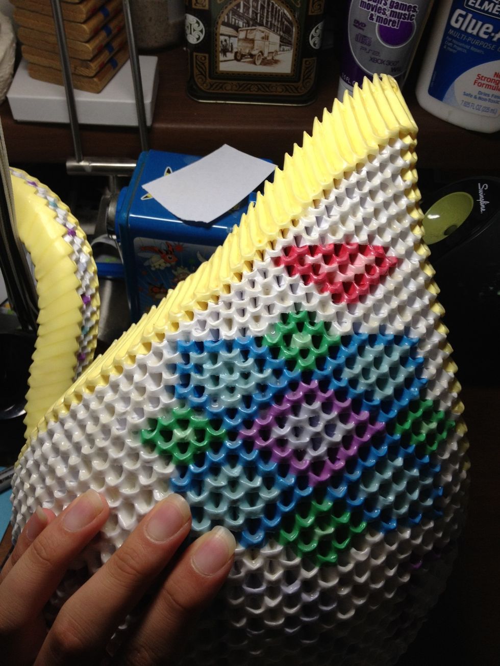 The bottom row will have the most amount of pieces. As you ascend up the wings, every two rows will contain the same number of pieces. (so if the bottom had 15, then the next two rows would have 14).