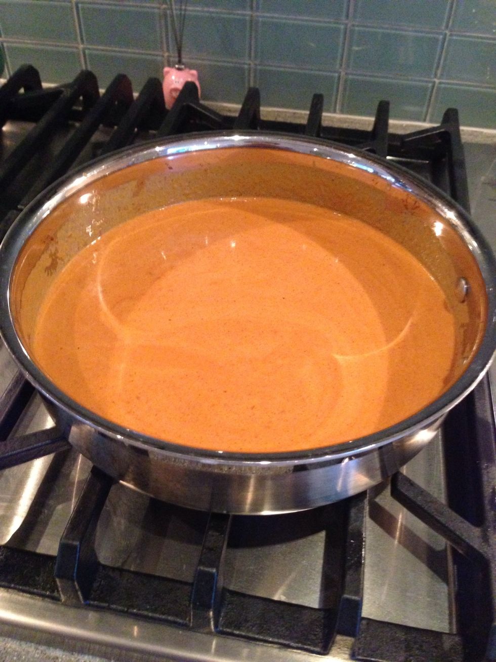 The butter sauce is done. Just let it simmer for 5 minutes. Then set aside until the chicken is done at which time you can heat it up again.