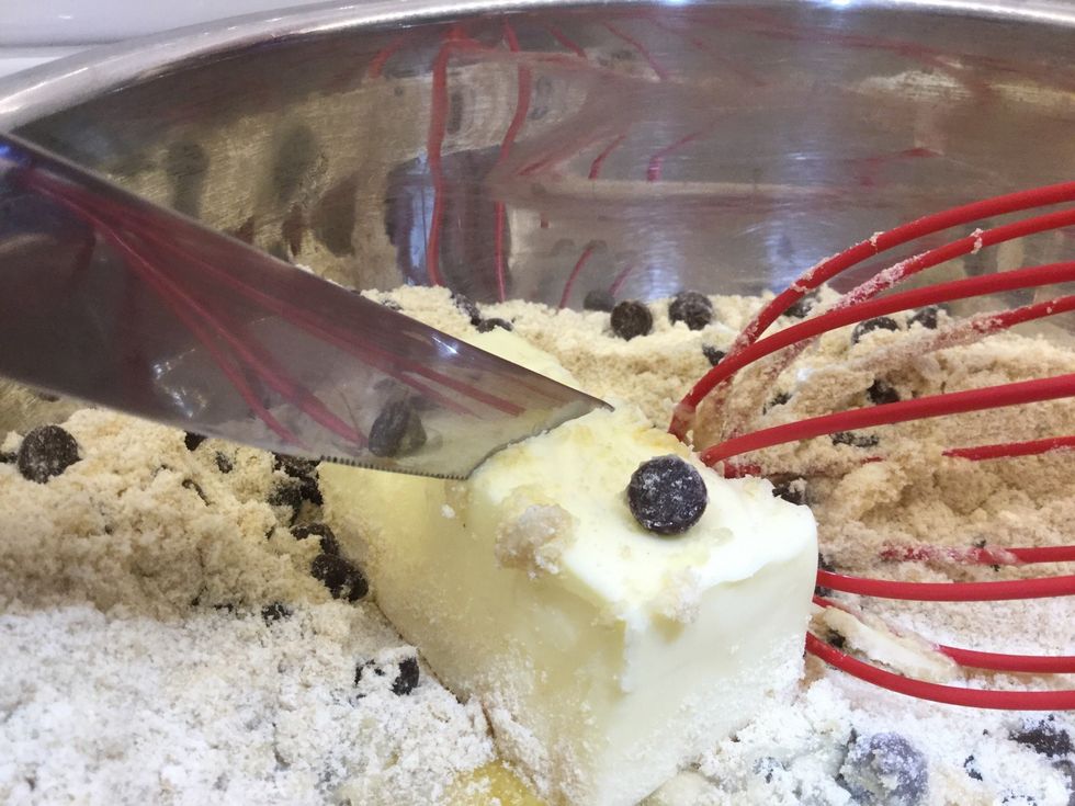 The butter was a little hard, so I used a butter knife to chop it up into smaller pieces \ud83d\ude0a