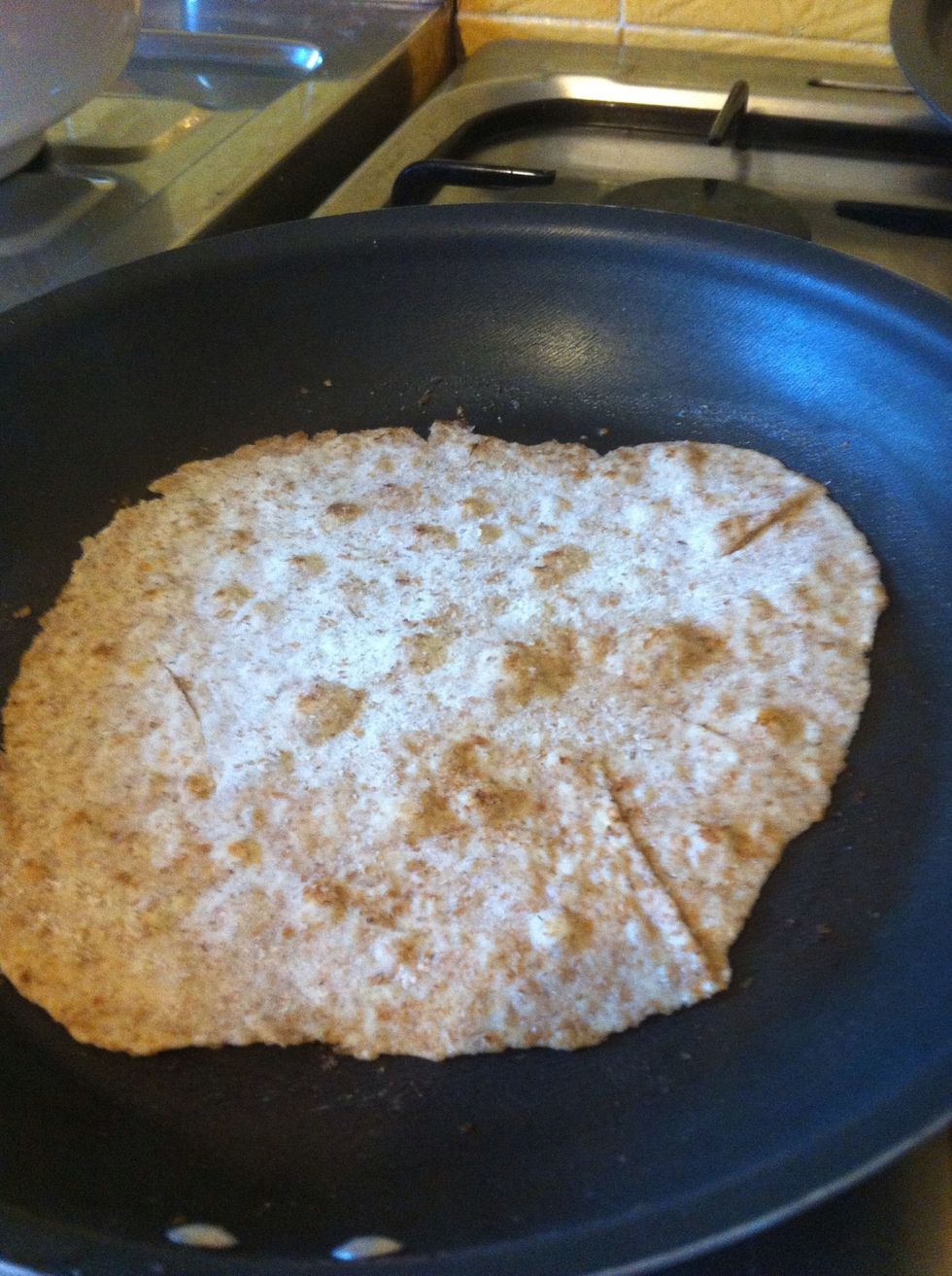 The butter will stop it sticking and add flavour. Keep it moving slightly and press slightly. Keep turning to check if its looking pretty but try to only cook one side at a time.
