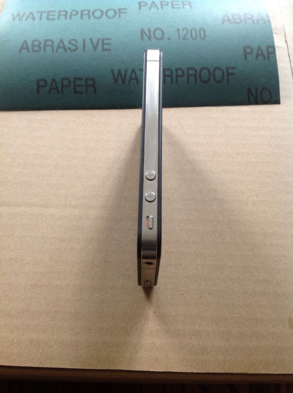 The buttons are tricky, put one end of the sand paper against the button then sand away from it. Repeating this action ALOT of times produced a good effect. Its Very time consuming.