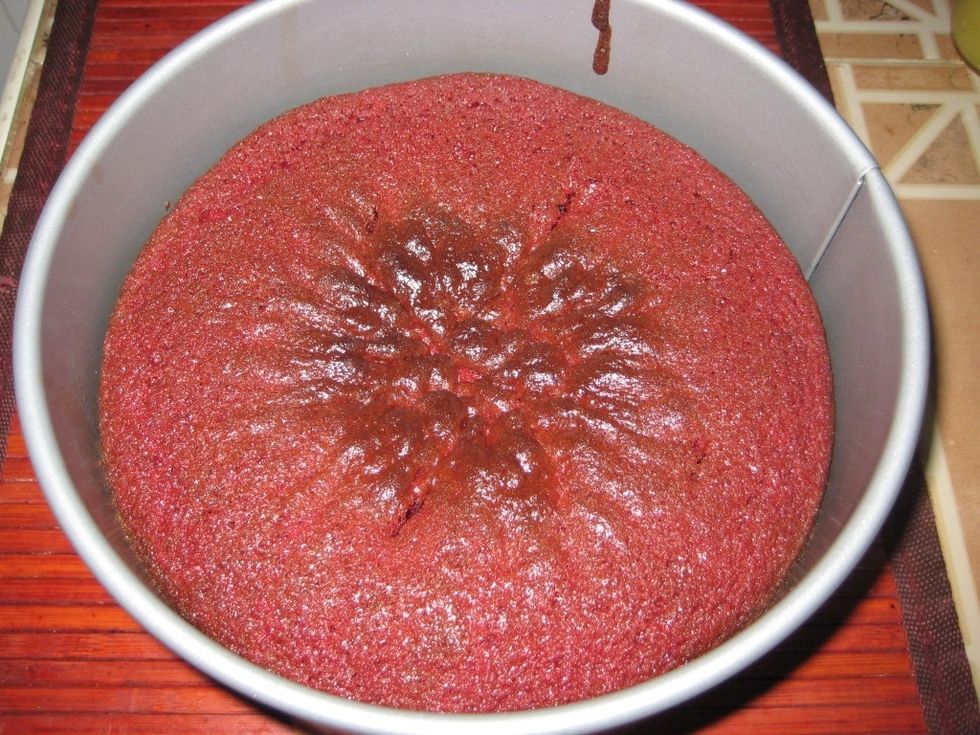 The cake is cooked when a small knife inserted into it comes out dry. It took 45 minutes to cook in a 23cm round tin.