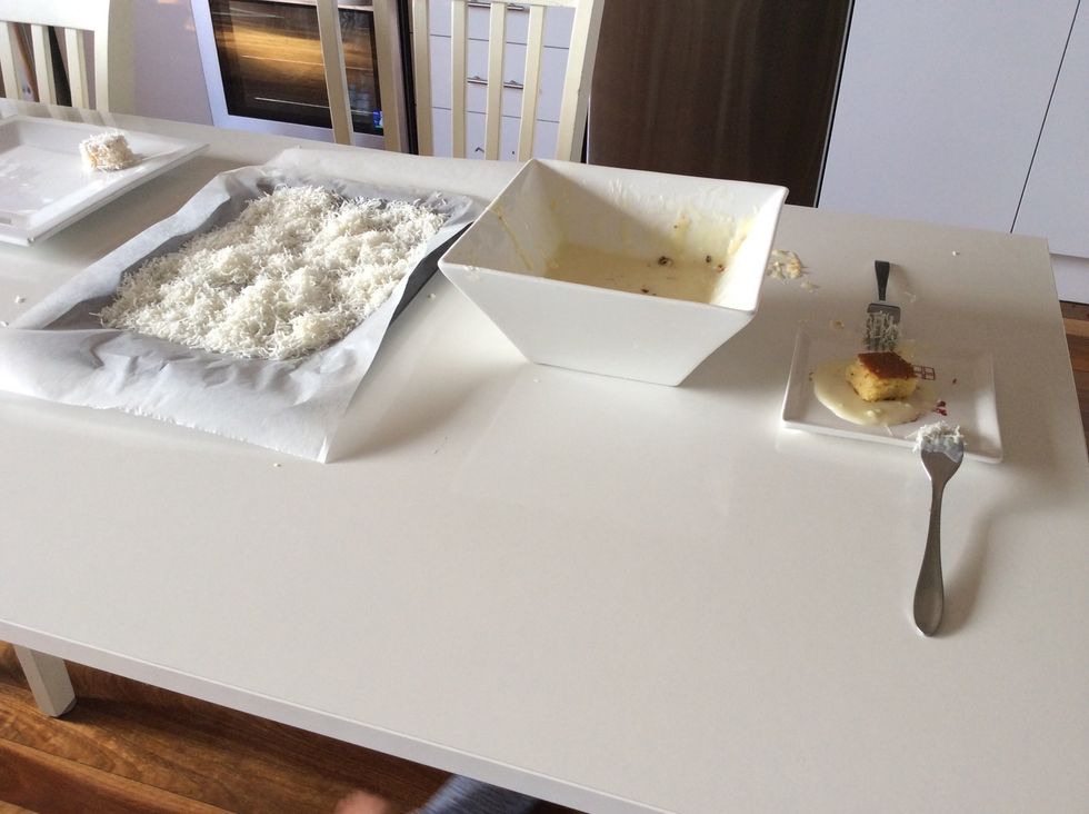 The cake was too soft so we couldn't use the actual recipe. What we did was we got a spoon and put the icing on top of the cake. We then rolled the cake into the coconut thus making a lamington!