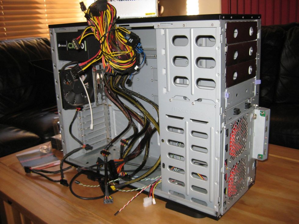 The case: due to having a daisy chain of USB hard drives, I wanted to be able to expand my storage easily, so I picked up an Antec Titan 550 on eBay this gave me space for 12x 3.5" drives (36 Tb)