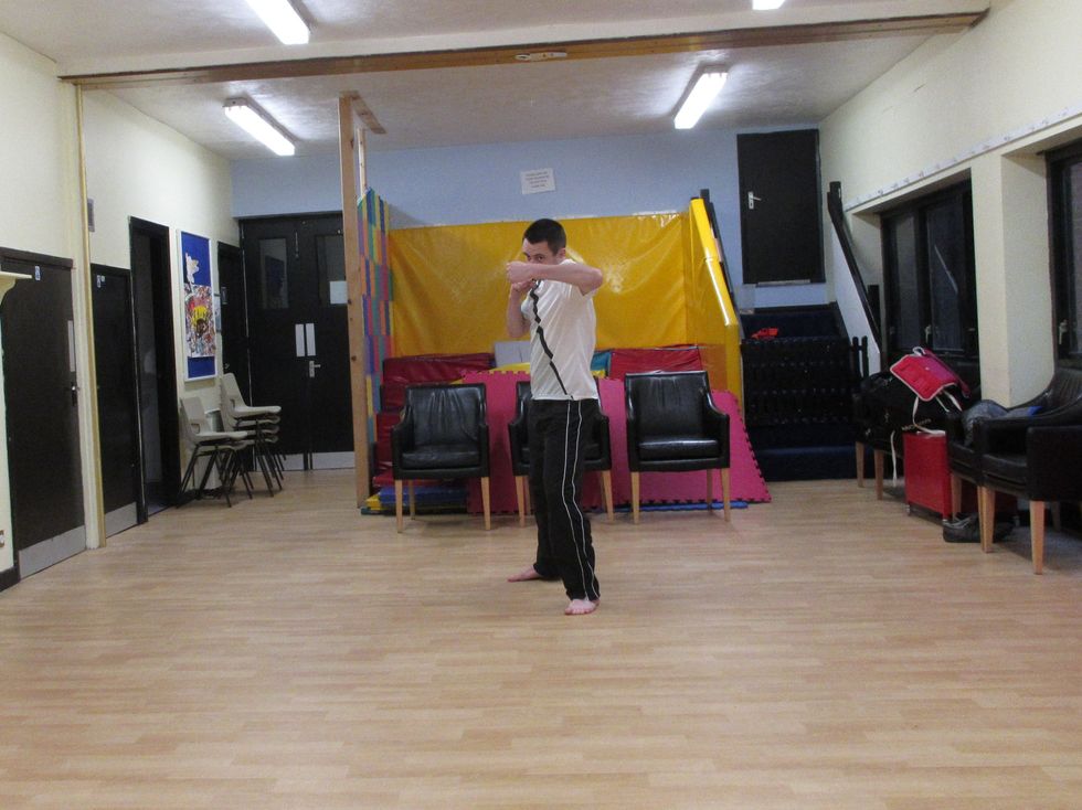 The centre of gravity should be shifted in towards the target. This is more powerful than simply leaning or reaching with the arm. I should finish the punch, ending in a strong position.