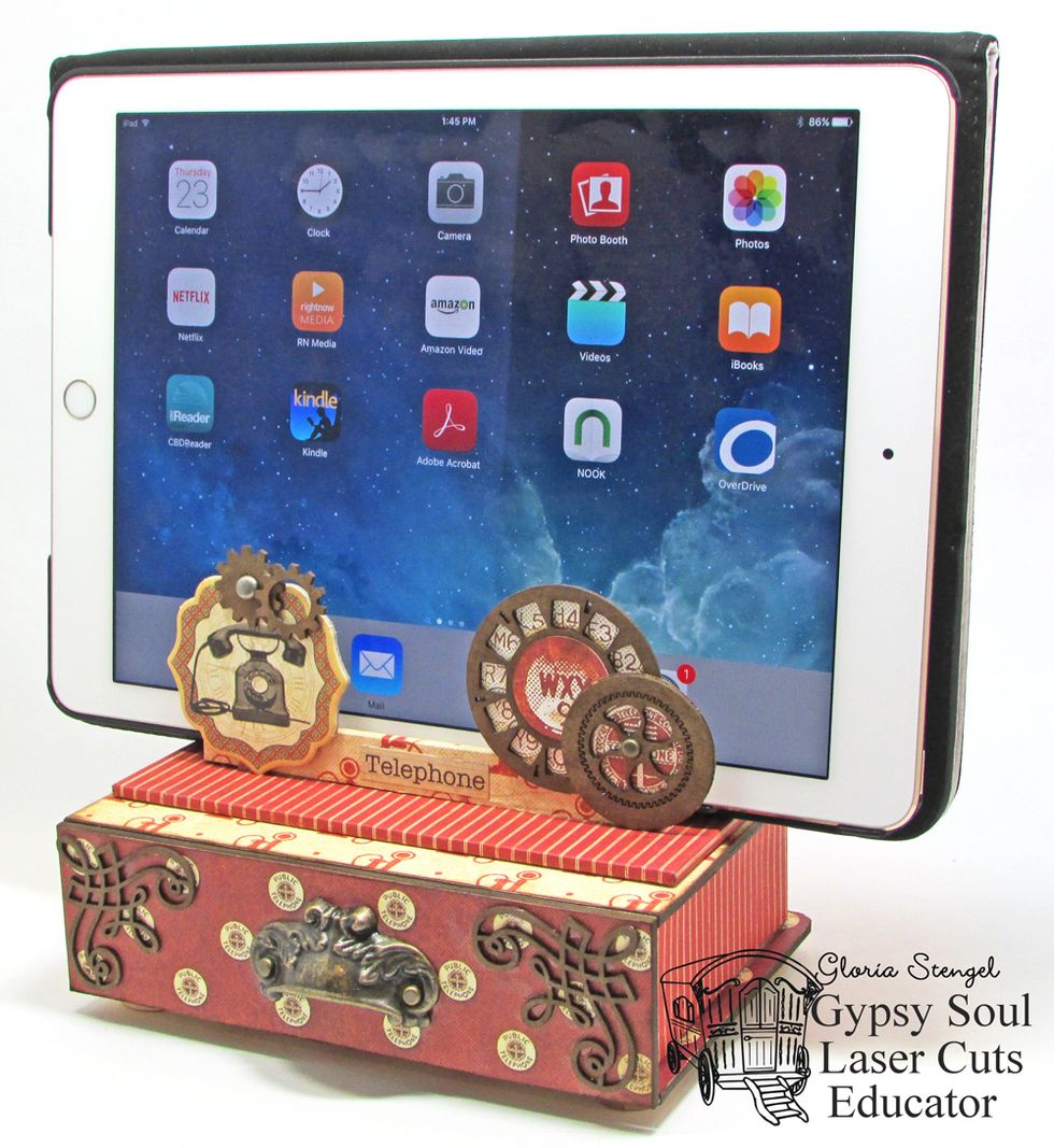 The charging station can also accommodate a tablet, with or without a tablet cover.