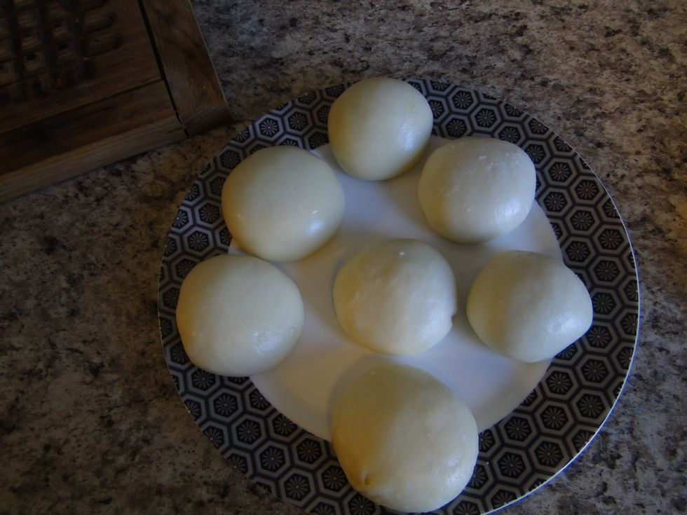The cheese is done when it becomes elastic and develops a shiny surface. Complete the process with the remaining solids. I estimate I ended up with about 1 lb of fresh mozzarella.