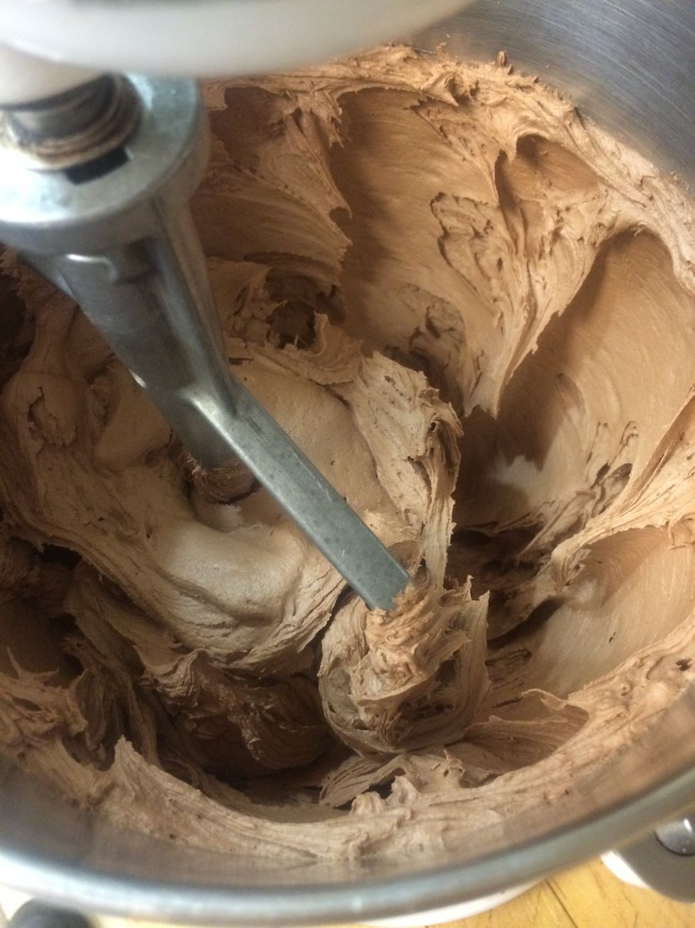 The chocolate butter cream frosting is the same recipe as the vanilla butter cream recipe with the addition of 1 cup of cocoa and 2 tbls of brewed coffee to help melt the cocoa.