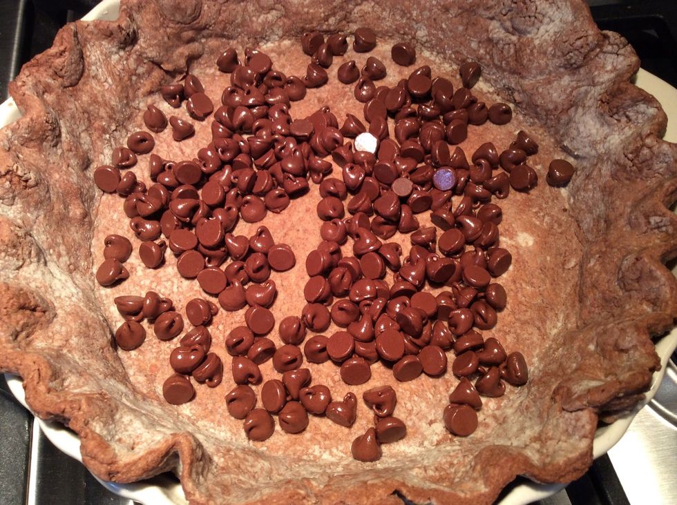 The chocolate chips will appear shiny after a few minutes of sitting in the hot pie plate.