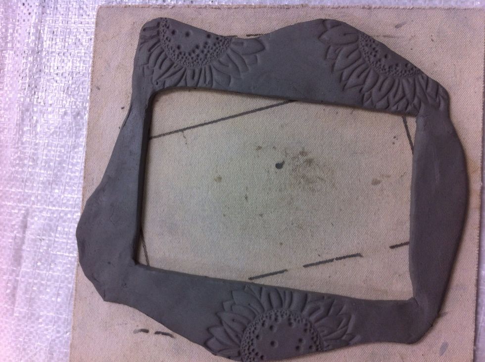 The clay leaves no residue on the stamp. Easy!! At this point you have to decide, is this a frame or a loom. If only a frame, stop here and let dry. Then move to the painting slide.