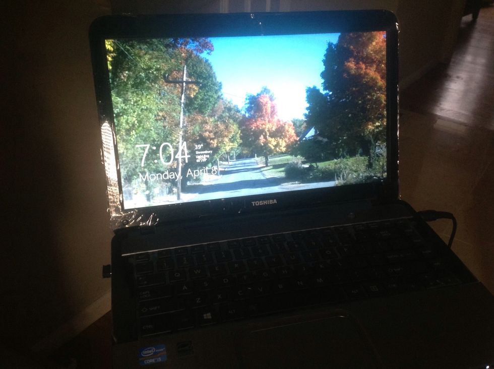 The computer turns electrical energy into light and sometimes sound energy. It also gives thermal energy while it's working.