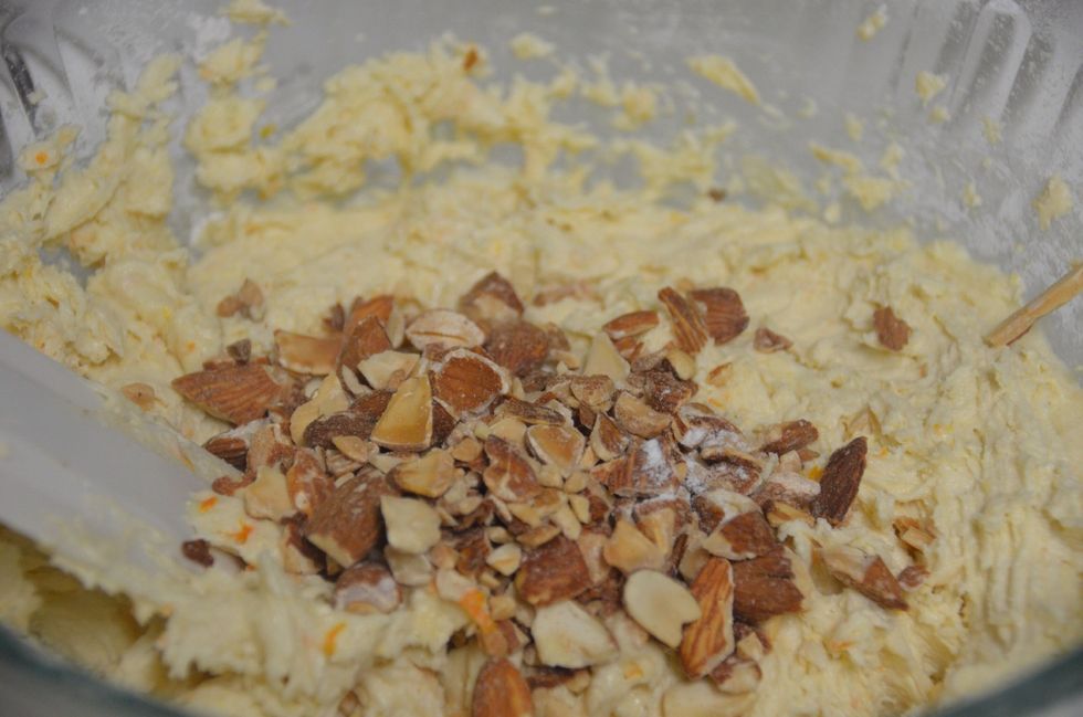 The cookie dough will look like this once you add the dry ingredients and mix with hand mixer. Then Add the toasted almonds.