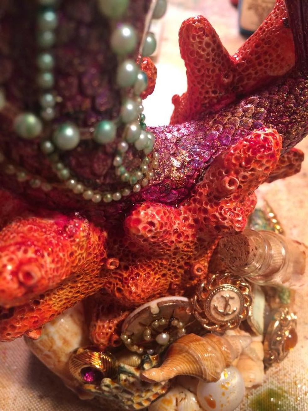 The coral was a bit brighter than I wanted, so I grabbed my Salted Caramel again and misted the coral. I also added more to her hair. I was going for an aged affect and it worked great.