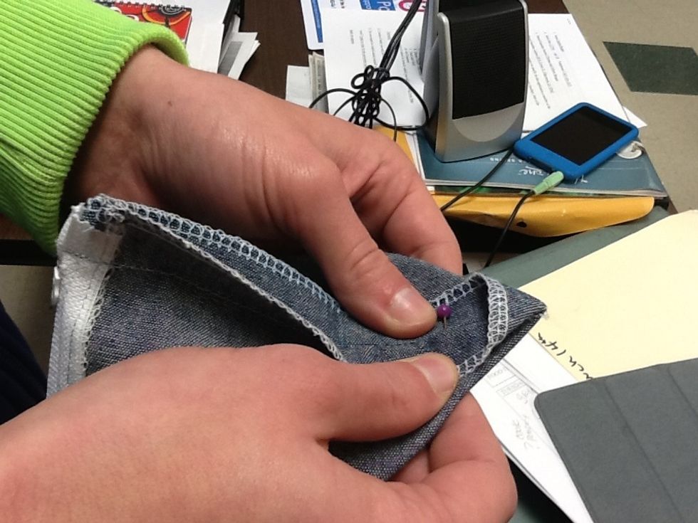 The corner should look like a triangle. Pin.