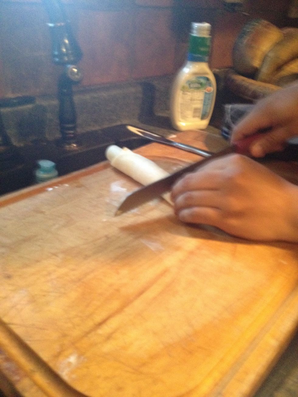 The cut from the end and keep going till u made a pinwheel shape