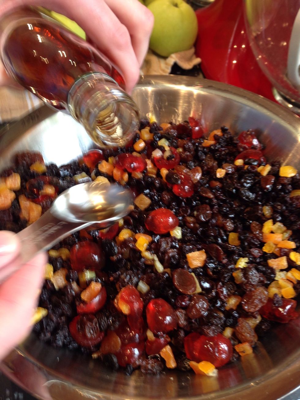 The day before making the cake, measure all of the dried fruits into a bowl and soak them in the brandy and black tea. Leave overnight to let them absorb the liquid