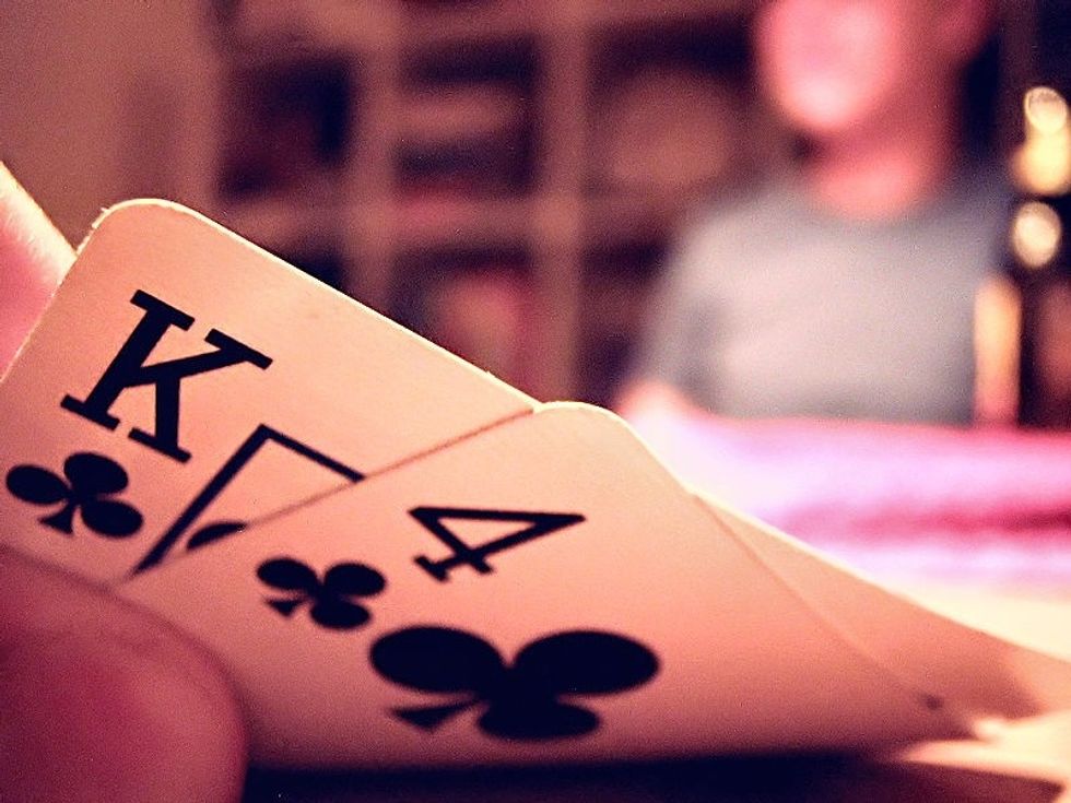 The dealer shuffles and distribute the cards face down starting with the player to his left and continuing clockwise. Each player is dealt 2 cards face down. These are called: "hole" or "pocket" cards