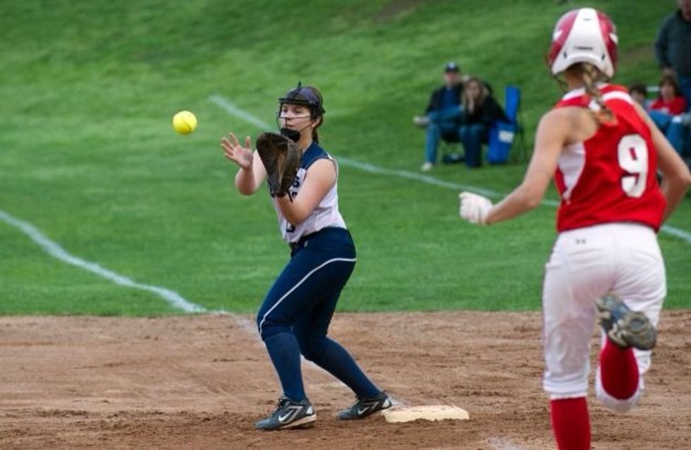 The defensive player that is supposed to catch the ball and get the runner out, has to either tag the player or touch their base.