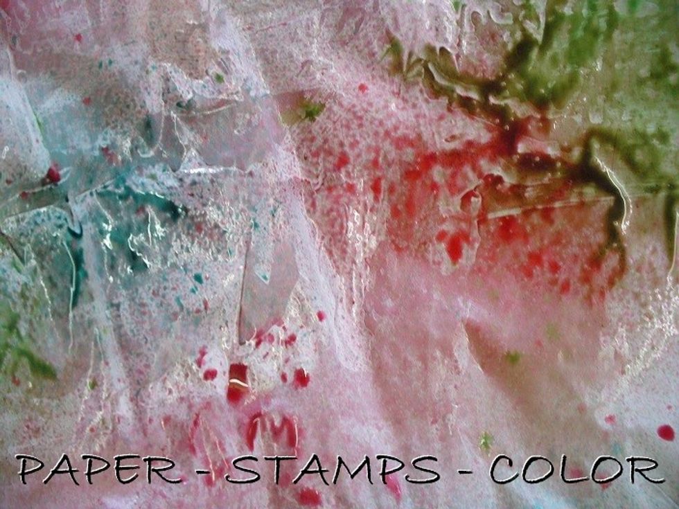 The deli paper all wet from the gesso and sprays.