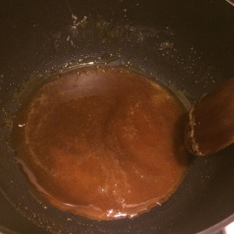 The dissolved sugar should now be liquified and a light brown color. If you end up burning it, you must start over or else flan will take on that strong sugar taste. Immediately remove from heat.