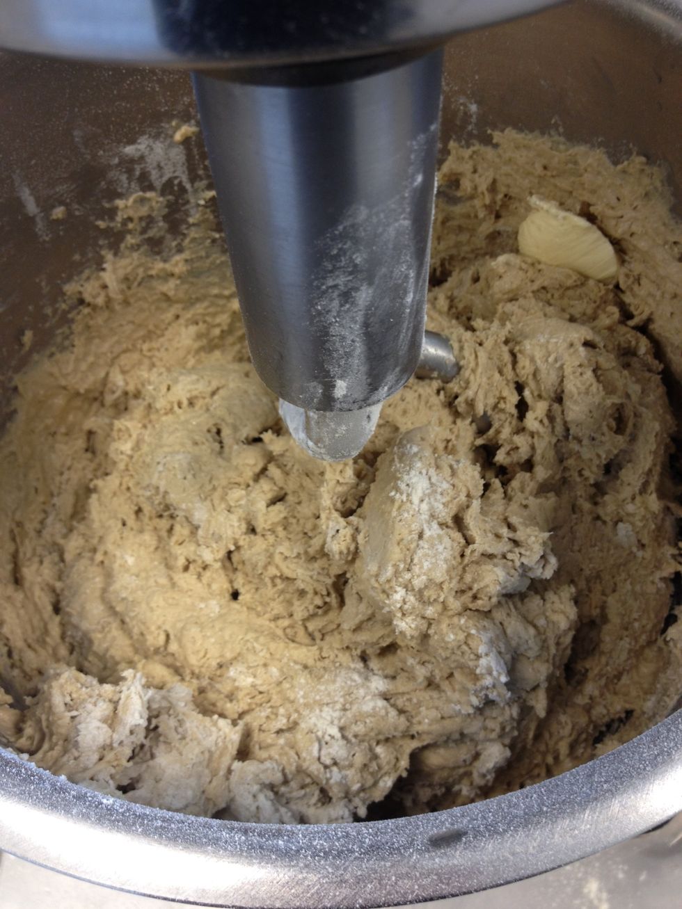 The dough will be sticky and wet but don't panic. Do not add more flour just keep mixing.