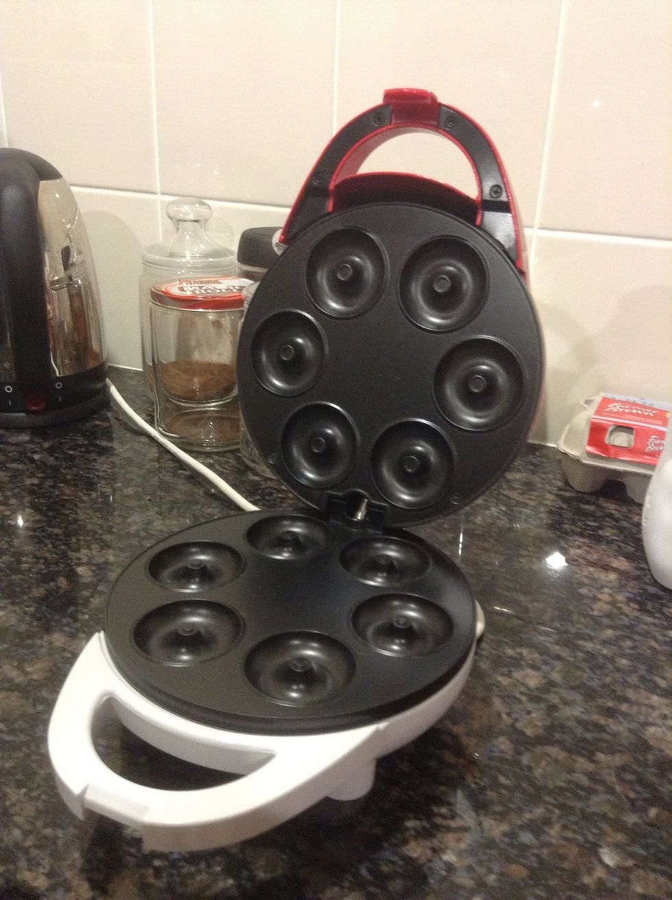 The doughnut maker. We sprayed it with non stick spray so the doughnuts won't stick to the machine.