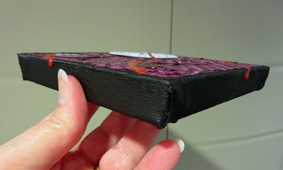 The drips went into the grooves created by the paint.