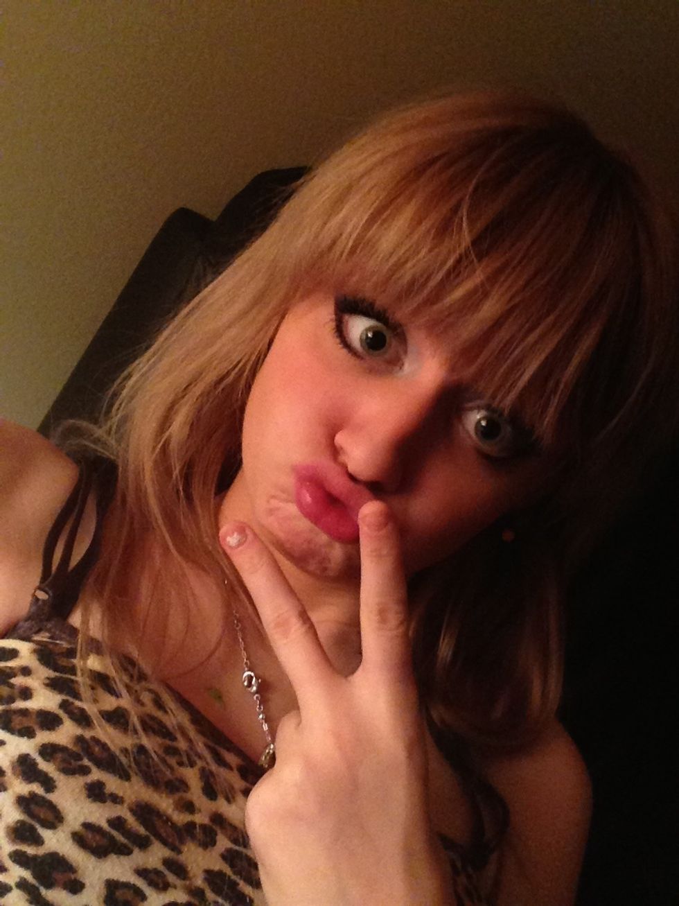 The duck face and peace sign.