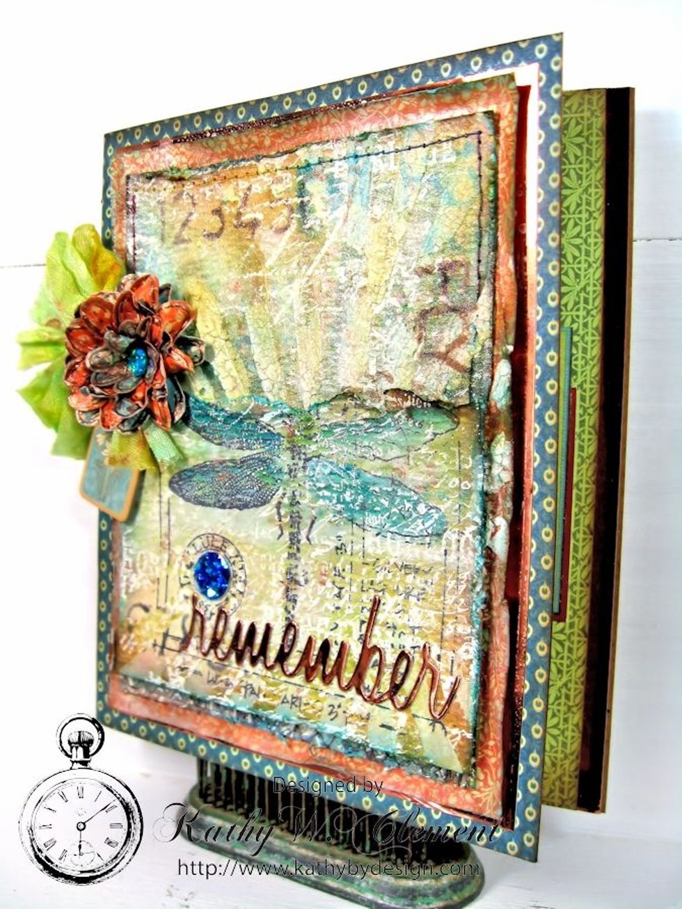 The edges were distressed, then the panel was stitched onto Graphic 45's Artisan Style papers &more copper cardstock. I custom dyed a seam binding bow &created a handmade flower to finish the card.